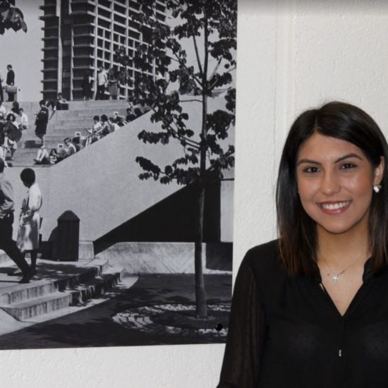 student smiling on campus