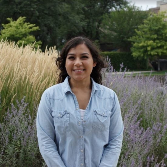 student smiling on campus