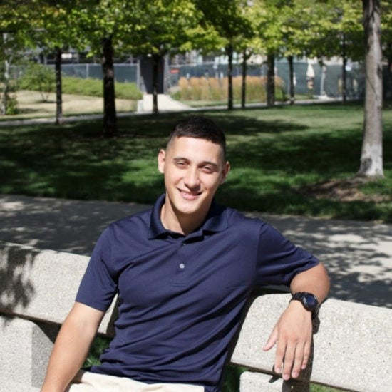 student smiling on campus