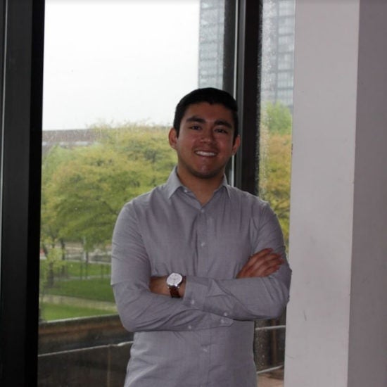 student smiling on campus