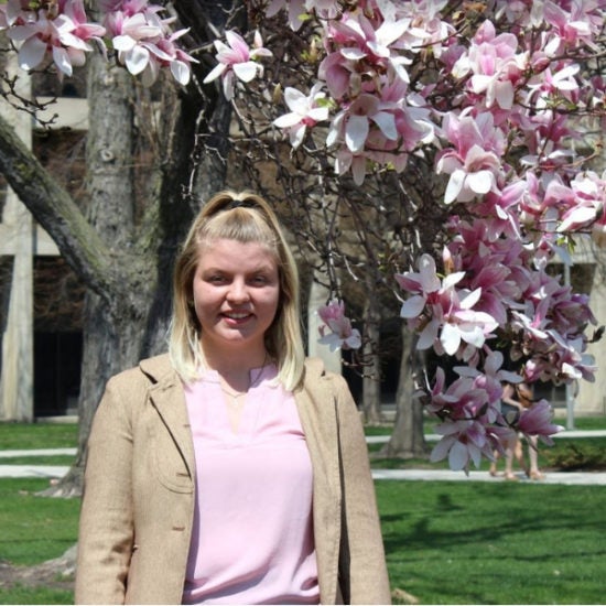 student smiling on campus