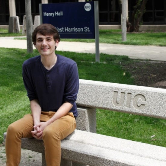 student smiling on campus