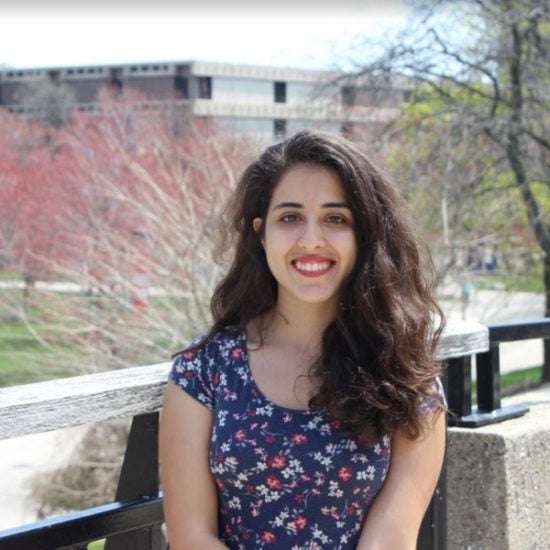 student smiling on campus