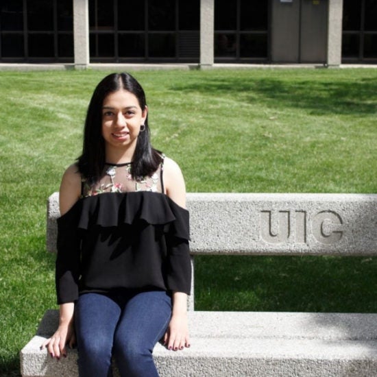 student smiling on campus