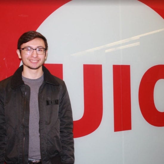 student smiling on campus