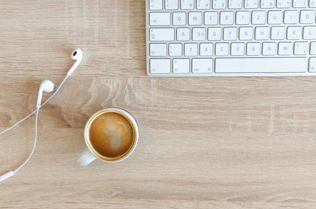 Coffee and white keyboard